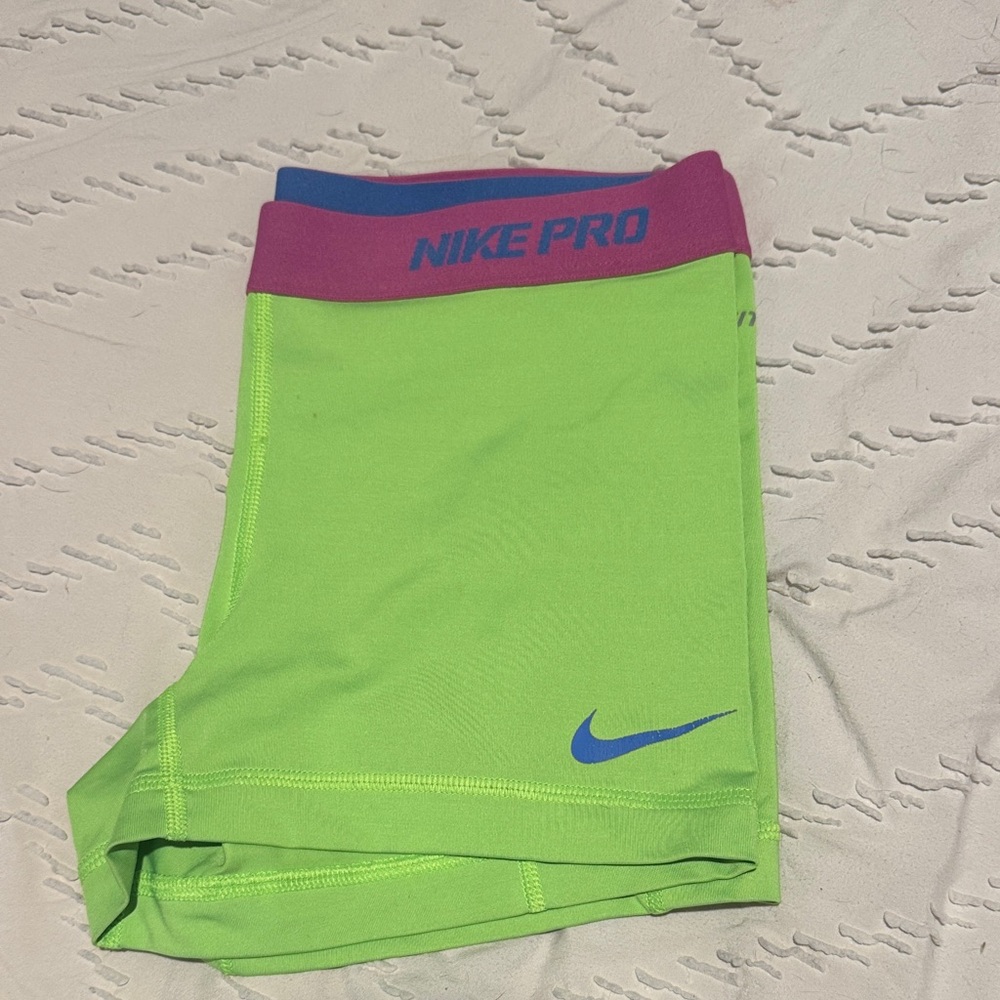 Nike Pro Lime Green Shorts with Blue and Pink Accents